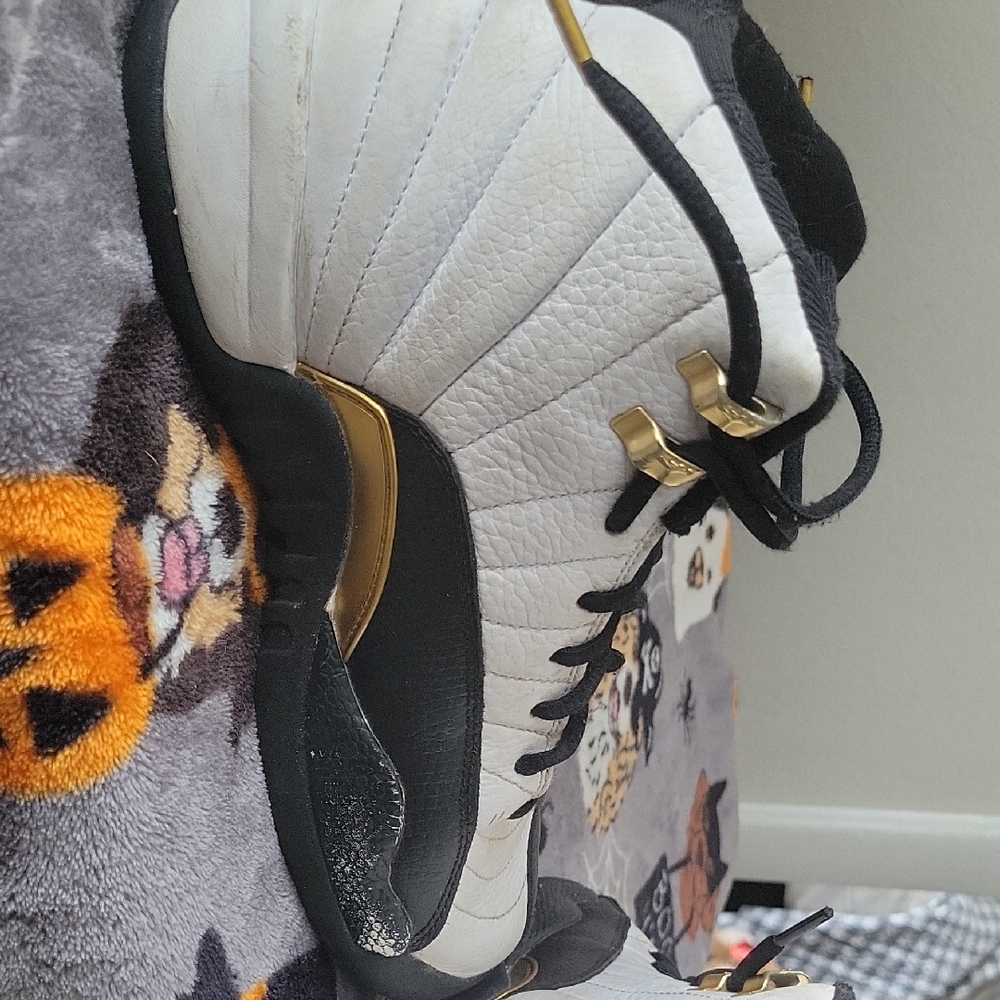 White and Black Sneakers with Gold Accents